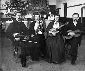 Images Dated 26th July 2018: Musical group, Padstow, Cornwall. Early 1900s