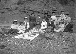 Padstow Collection: A picnic party below cliff, Padstow, Cornwall. Probably 1890s or early 1900s