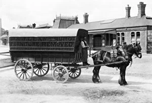 Truro Collection: R & J Lean furniture remover wagon outside Truro Railway Station, Cornwall. After 1893