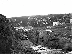 Images Dated 11th May 2018: View from the cliff over the slipway and cottages behind, Porthgwarra, Cornwall. Early 1900s
