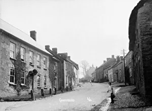 Grampound Collection: A view up the hill, Fore Street, Grampound, Cornwall. Early 1900s