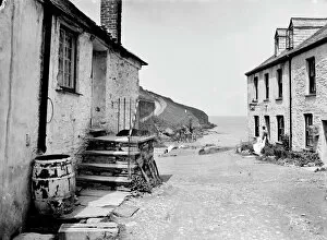 Port Gaverne Collection: Village street in Port Gaverne, St Endellion Cornwall. 1906