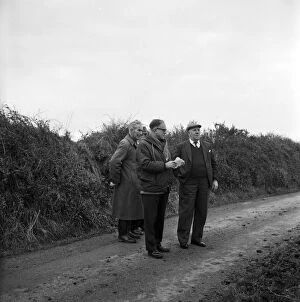 St Keverne Collection: Visiting group near Giants Quoits after they fell, St Keverne, Cornwall. 9th January 1966