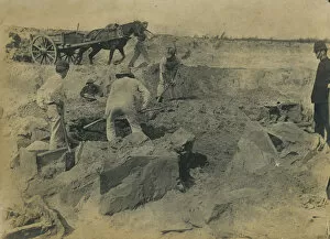 St Merryn Collection: Workmen uncovering a group of cists at the excavation site of the Iron Age cemetery at Harlyn Bay